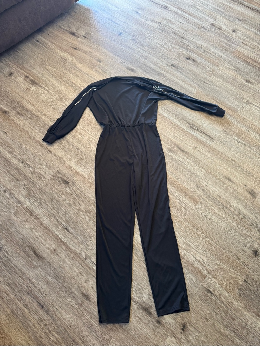Sleek Black Long-Sleeve Jumpsuit with Zip-Trim Sleeves